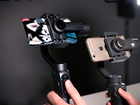 手機(jī)穩(wěn)定器選哪個(gè)？大疆OSMO手機(jī)云臺(tái) 2對比智云Smooth-Q